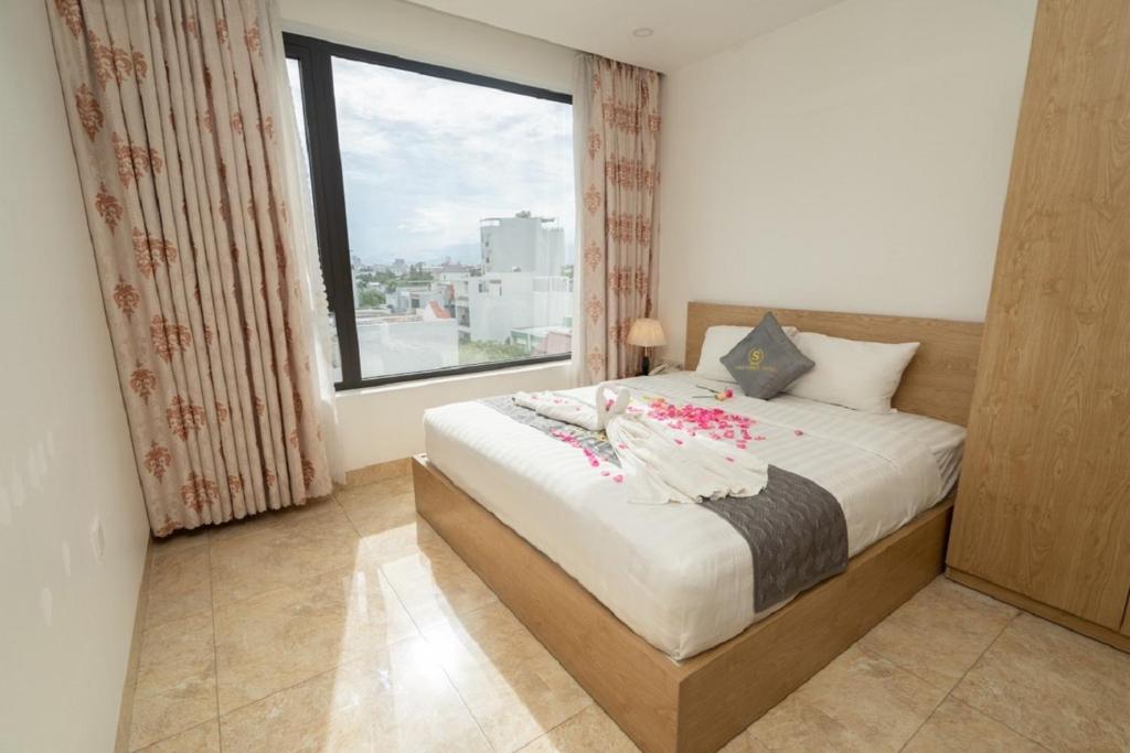 Postel nebo postele na pokoji v ubytování Gold Summer 2 Hotel