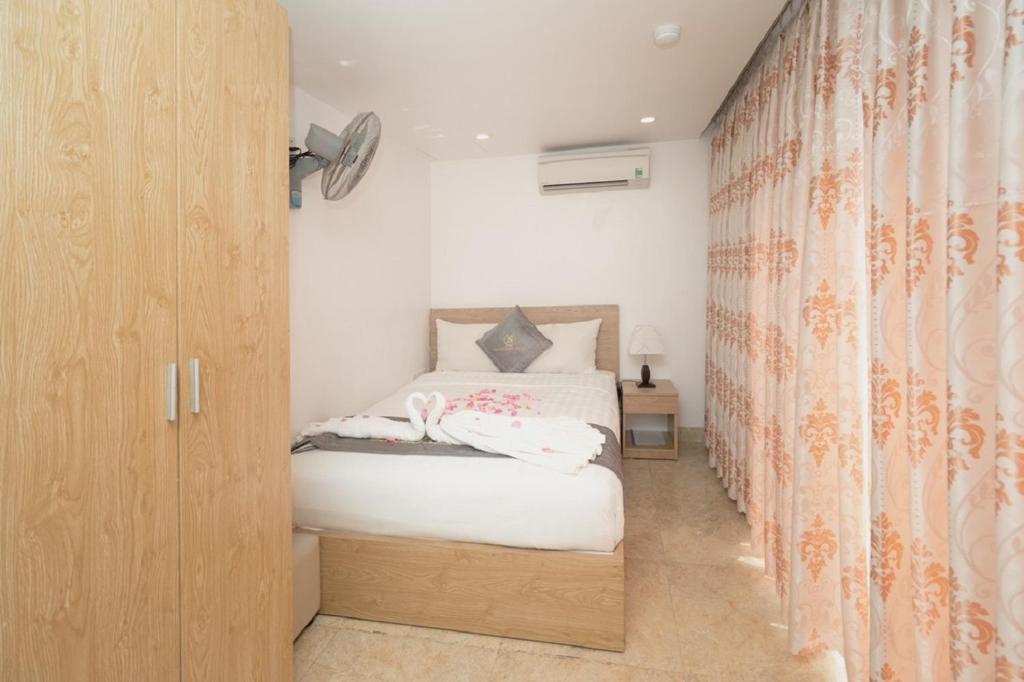 Postel nebo postele na pokoji v ubytování Gold Summer 2 Hotel