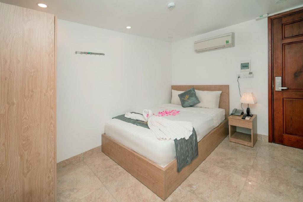 Postel nebo postele na pokoji v ubytování Gold Summer 2 Hotel
