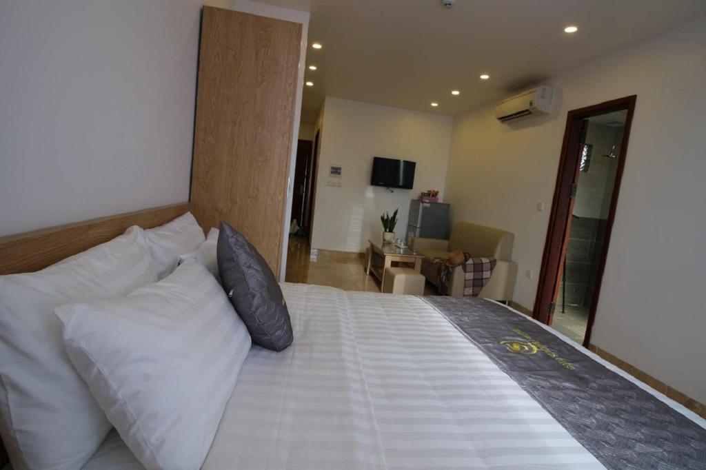 Postel nebo postele na pokoji v ubytování Gold Summer 2 Hotel