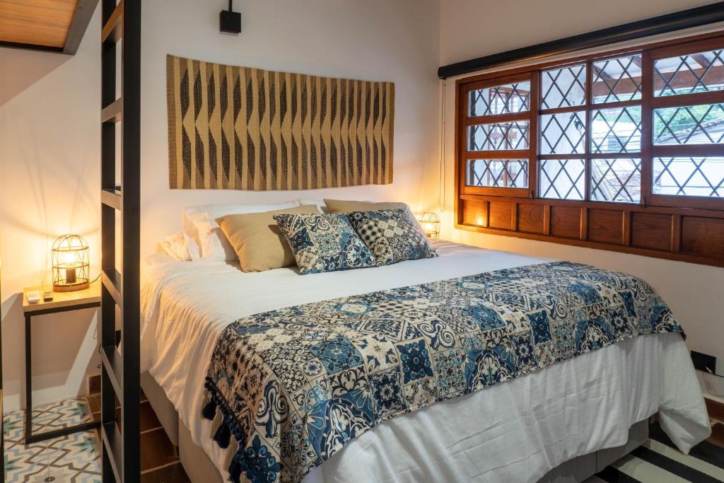 Postel nebo postele na pokoji v ubytování Casa Medallo
