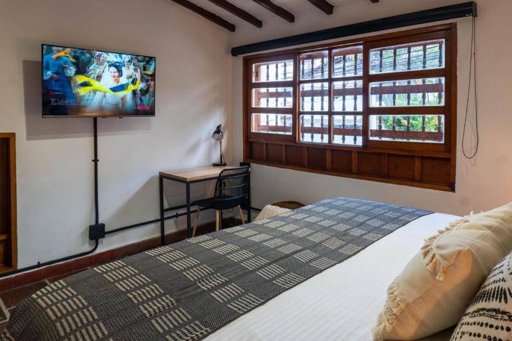 Postel nebo postele na pokoji v ubytování Casa Medallo