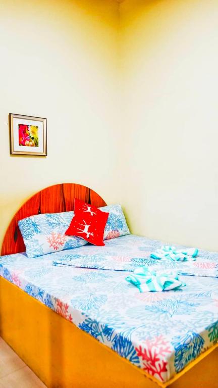 Postel nebo postele na pokoji v ubytování Heart Hotel and Services
