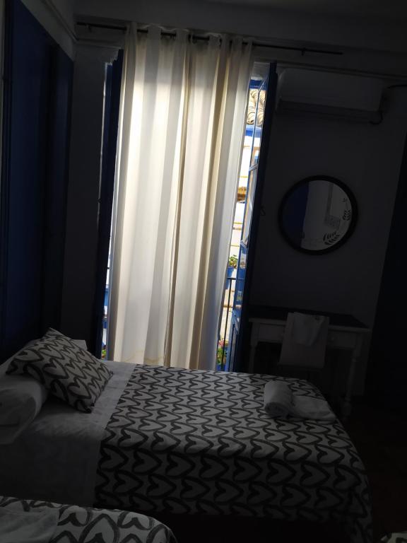 Letto o letti in una camera di The Dreamers&Co