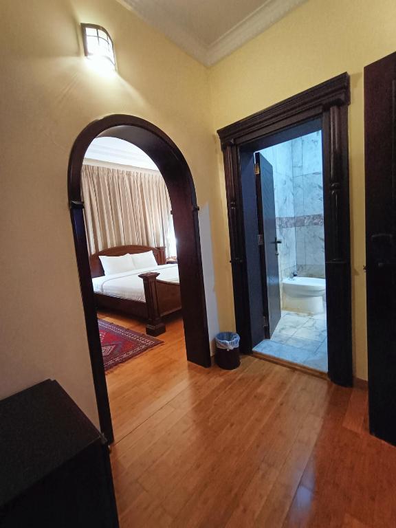 Katil atau katil-katil dalam bilik di Al Khariss Hotel