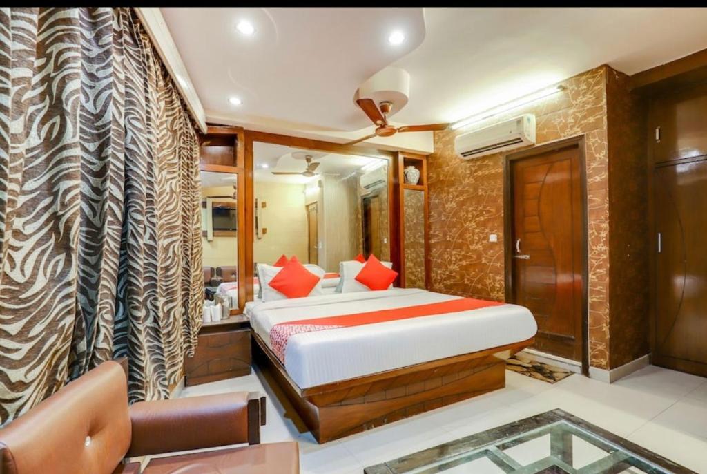 Postel nebo postele na pokoji v ubytování Hotel Roma Deluxe - New Delhi Railway Station