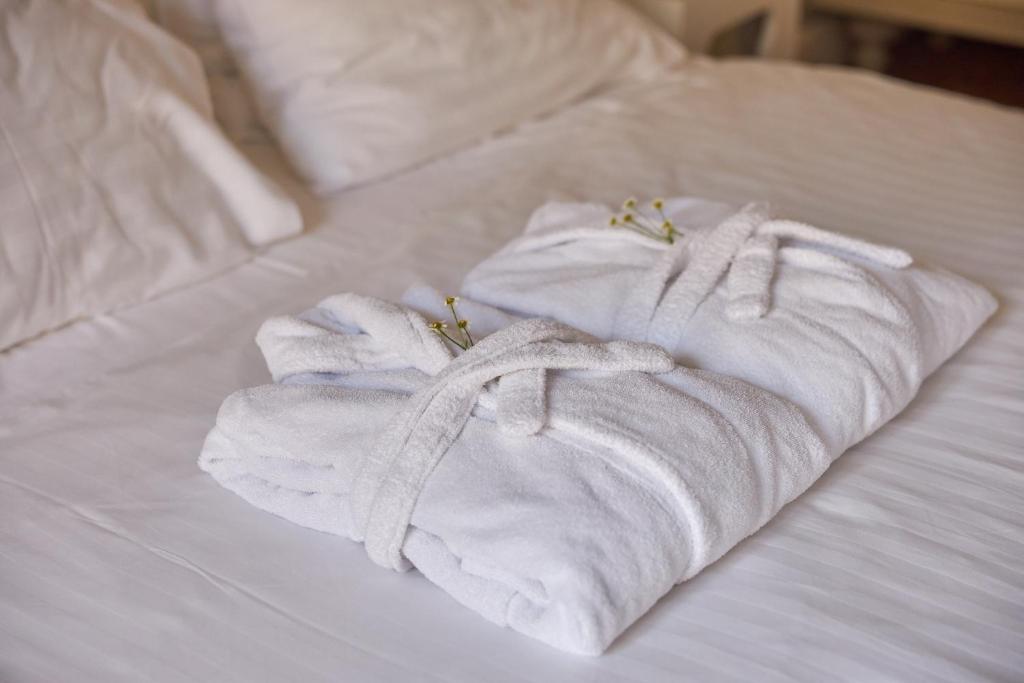 Postel nebo postele na pokoji v ubytování Ratonda Centrum Hotels