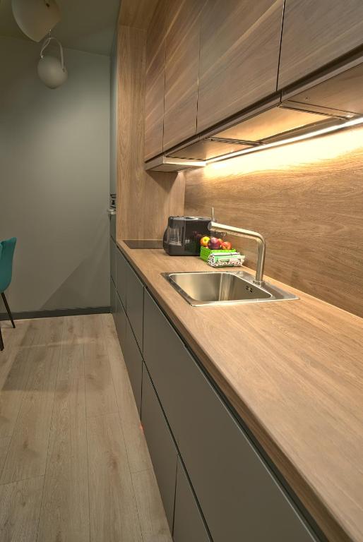 Kuchyňa alebo kuchynka v ubytovaní Apartament Witold