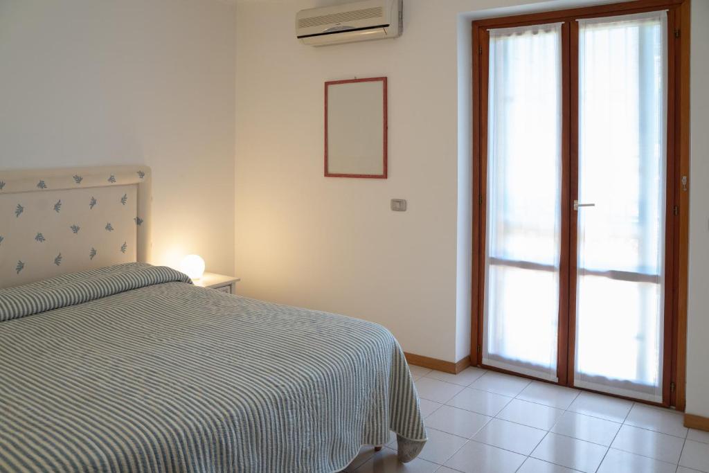 Posteľ alebo postele v izbe v ubytovaní Elegant apartment in residence with pool