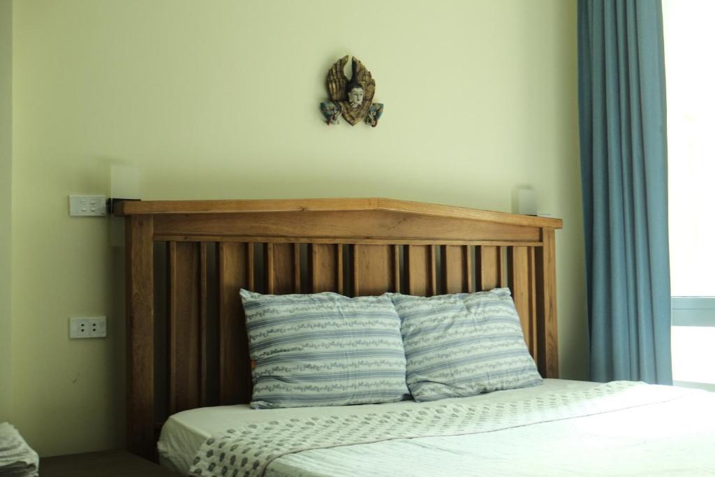 Postel nebo postele na pokoji v ubytování Auntie Liên's Homestay