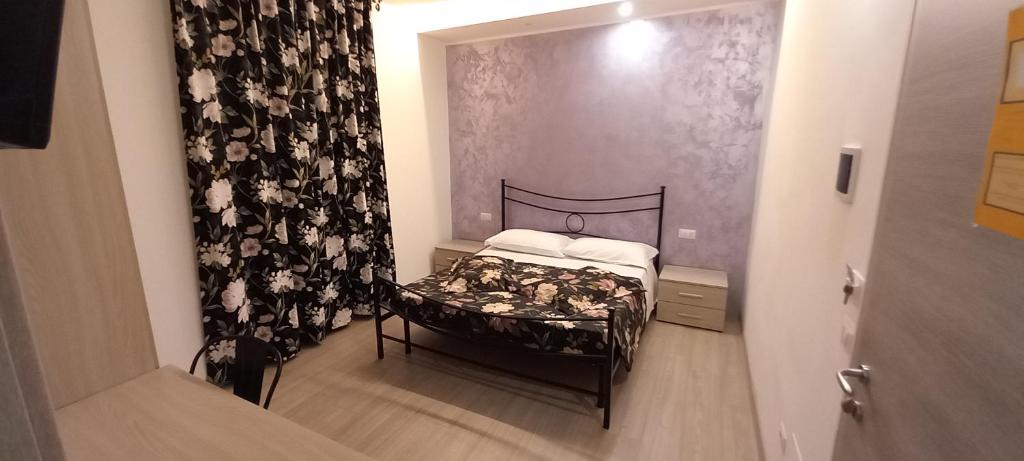 Postel nebo postele na pokoji v ubytování Albano Station Rooms