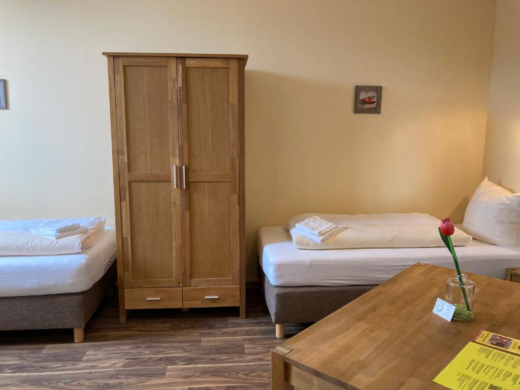 Postel nebo postele na pokoji v ubytování Landhotel Vosse-Schepers