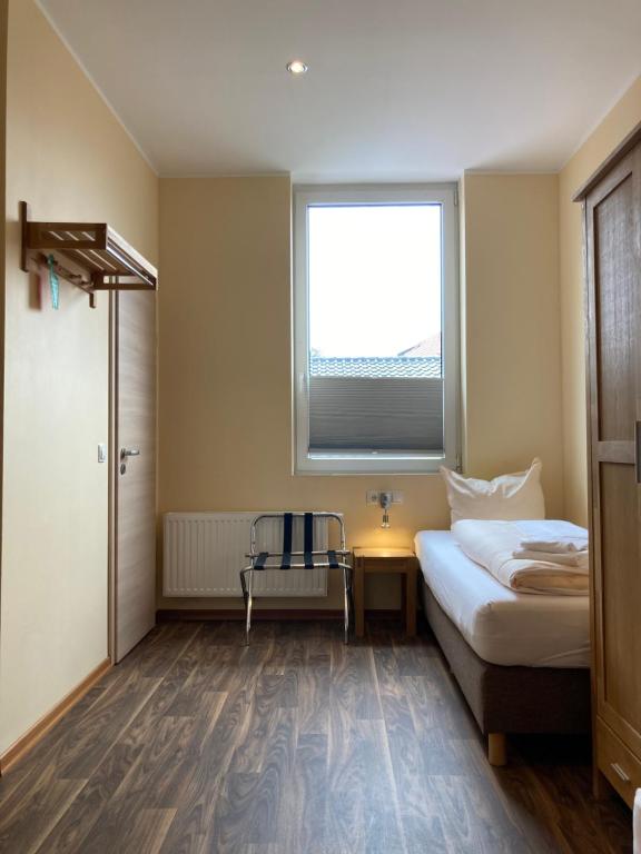 Postel nebo postele na pokoji v ubytování Landhotel Vosse-Schepers
