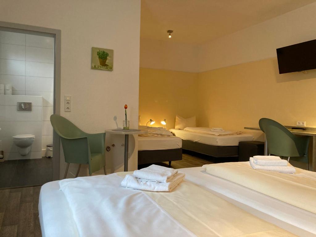 Postel nebo postele na pokoji v ubytování Landhotel Vosse-Schepers