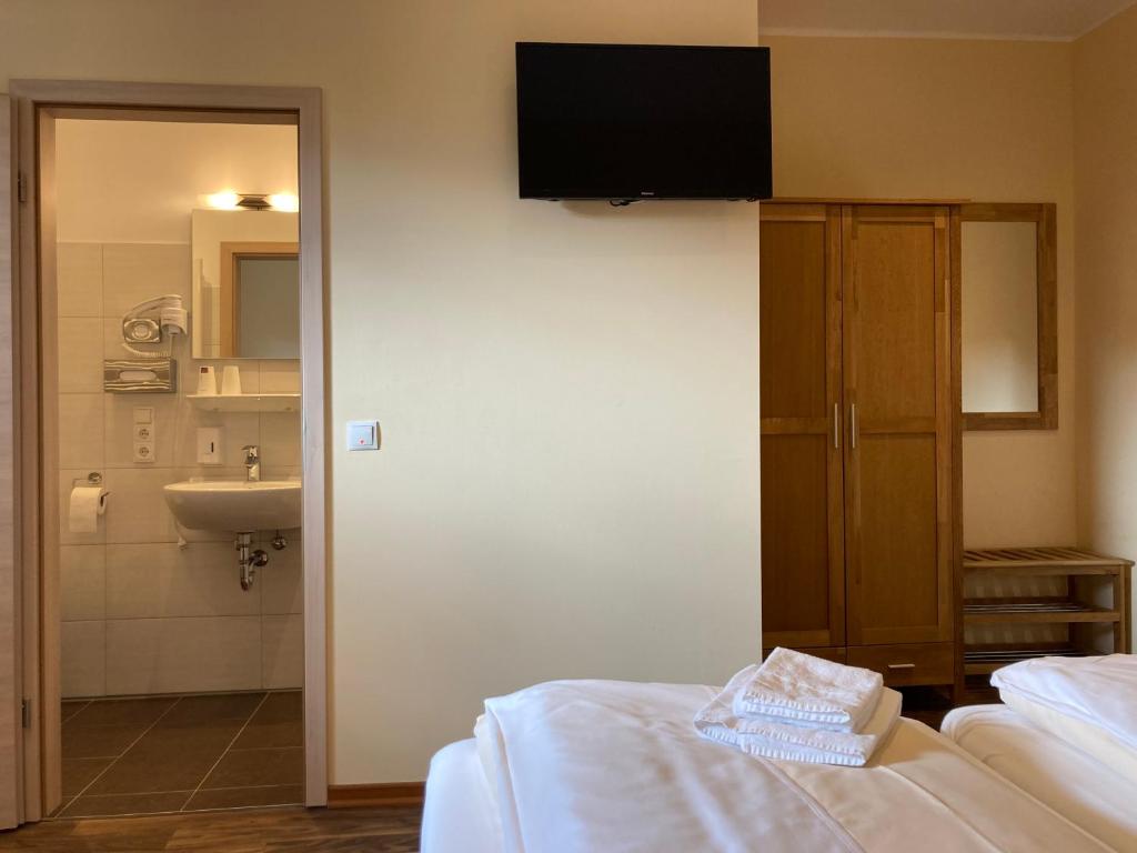 Postel nebo postele na pokoji v ubytování Landhotel Vosse-Schepers