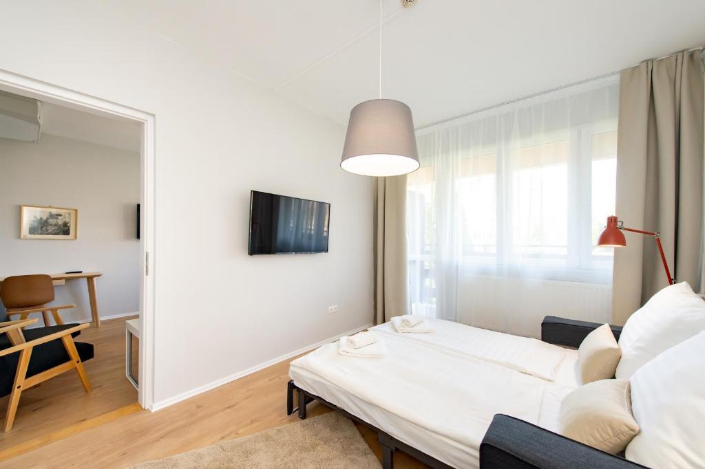 TV a/nebo společenská místnost v ubytování Hotel Forrás Zalakaros