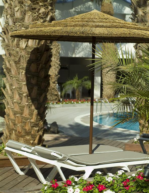 Der Swimmingpool an oder in der Nähe von Leonardo Privilege Eilat Hotel - All inclusive