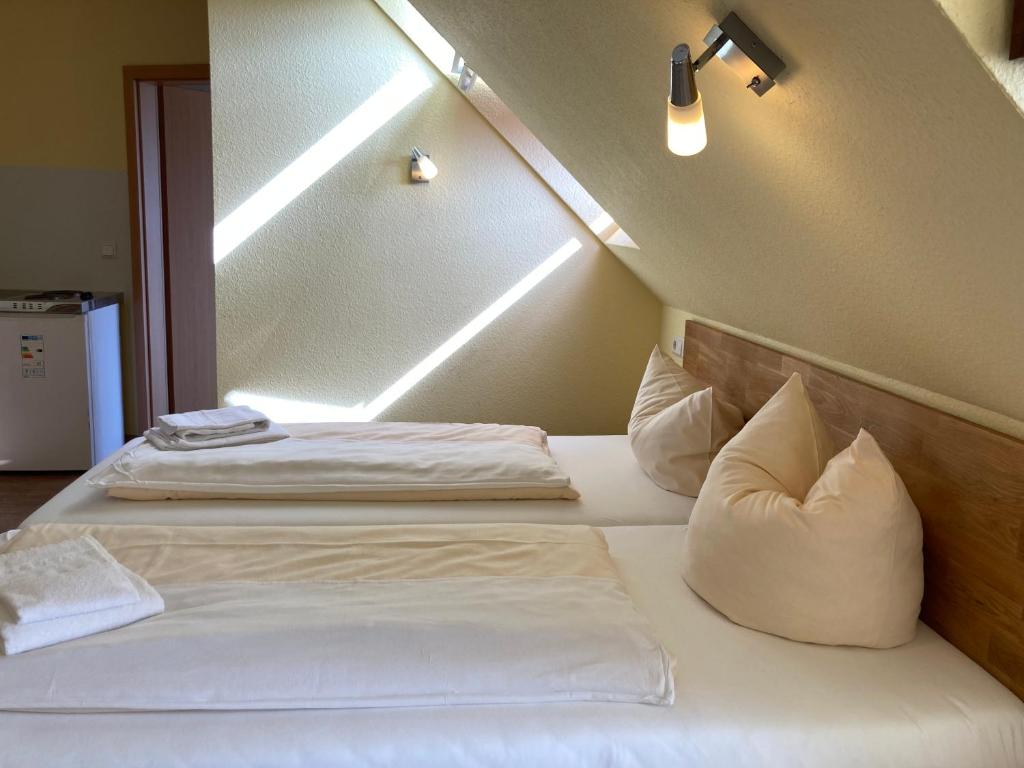 Postel nebo postele na pokoji v ubytování Landhotel Vosse-Schepers