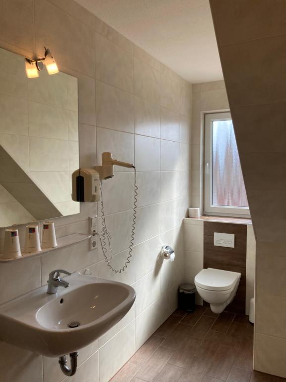 Koupelna v ubytování Landhotel Vosse-Schepers