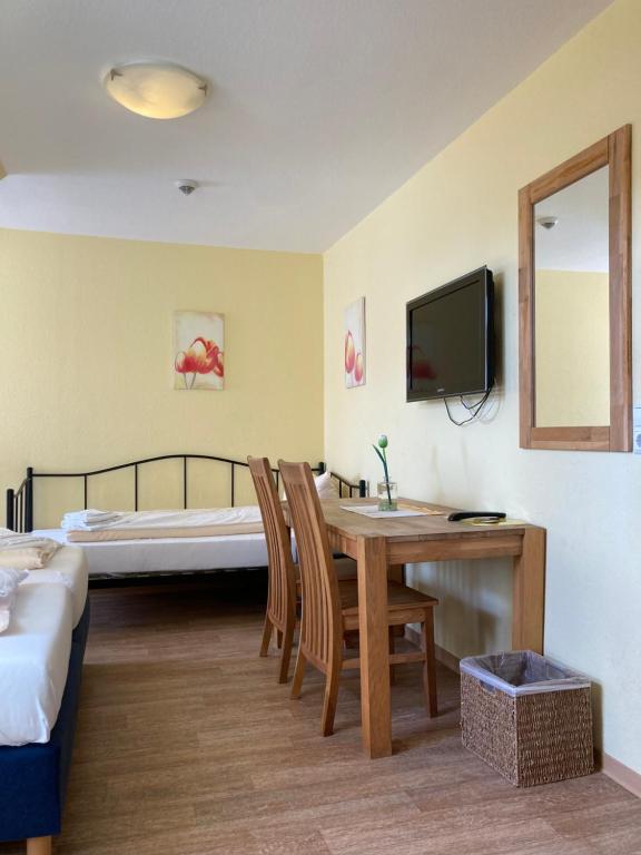 Postel nebo postele na pokoji v ubytování Landhotel Vosse-Schepers