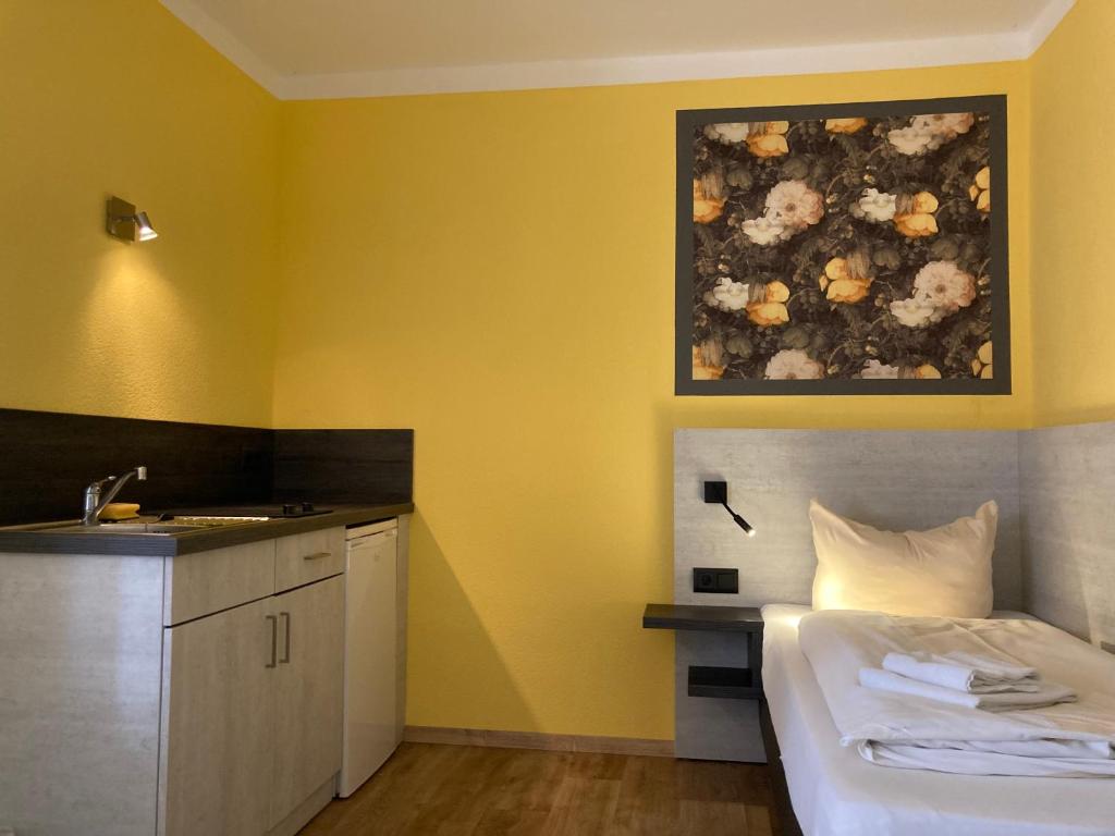 Postel nebo postele na pokoji v ubytování Landhotel Vosse-Schepers