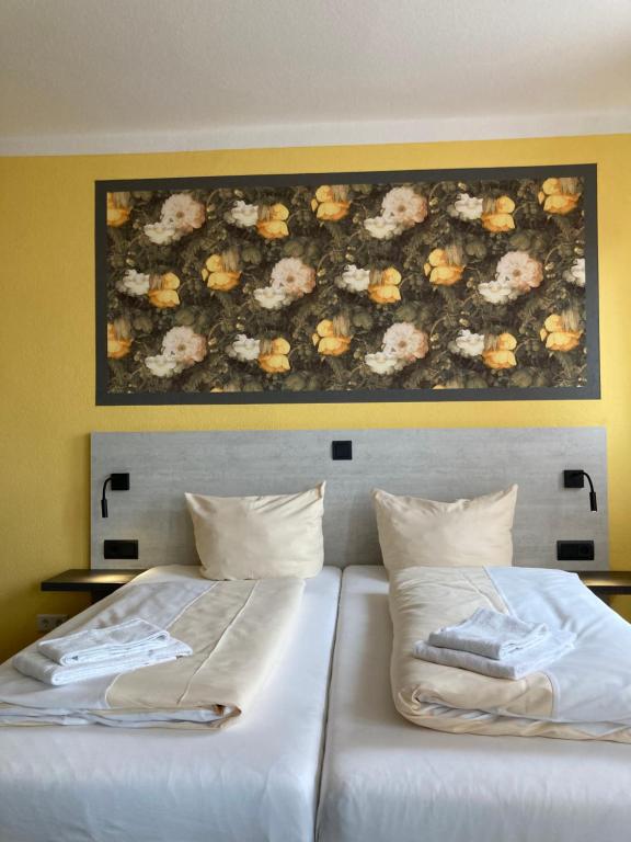 Postel nebo postele na pokoji v ubytování Landhotel Vosse-Schepers