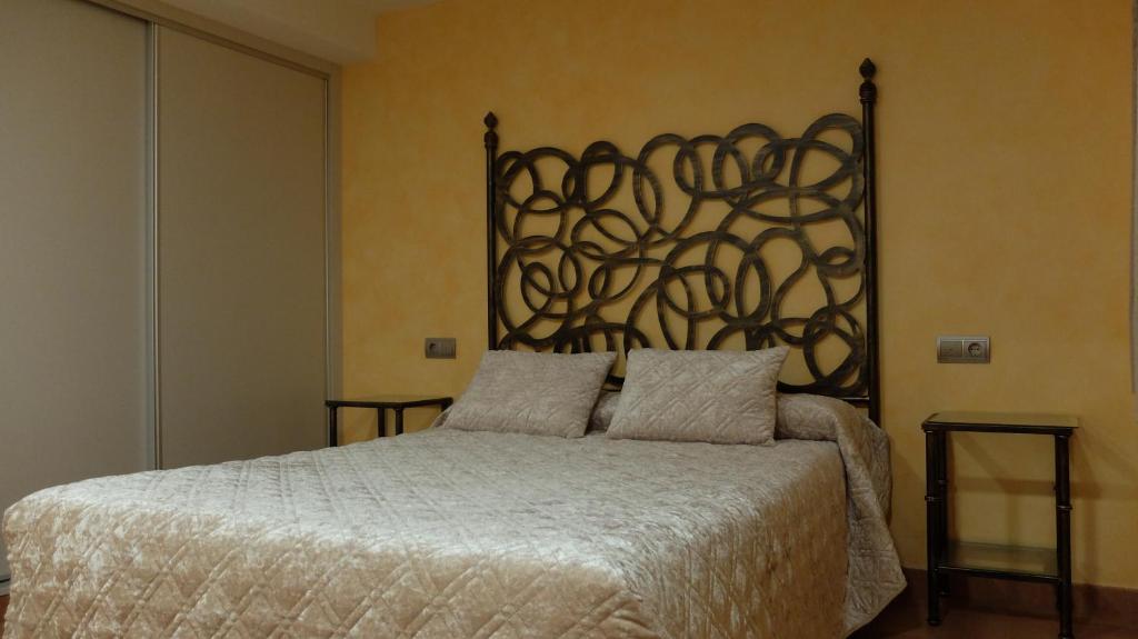 Posteľ alebo postele v izbe v ubytovaní Hotel Albergue La Casa Del Peregrino