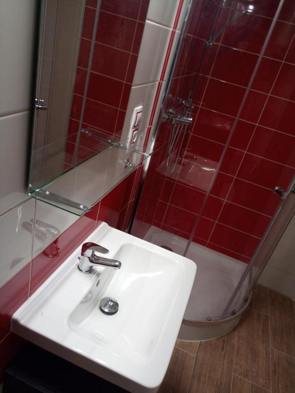 Koupelna v ubytování Apartmány Na hrnčírně