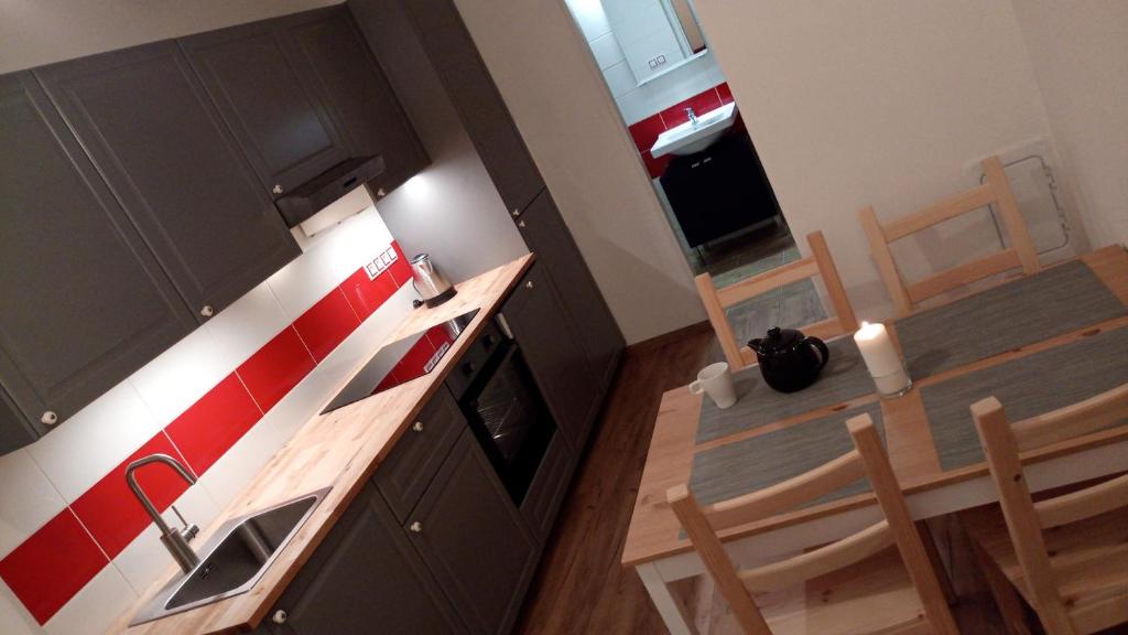Kuchyň nebo kuchyňský kout v ubytování Apartmány Na hrnčírně
