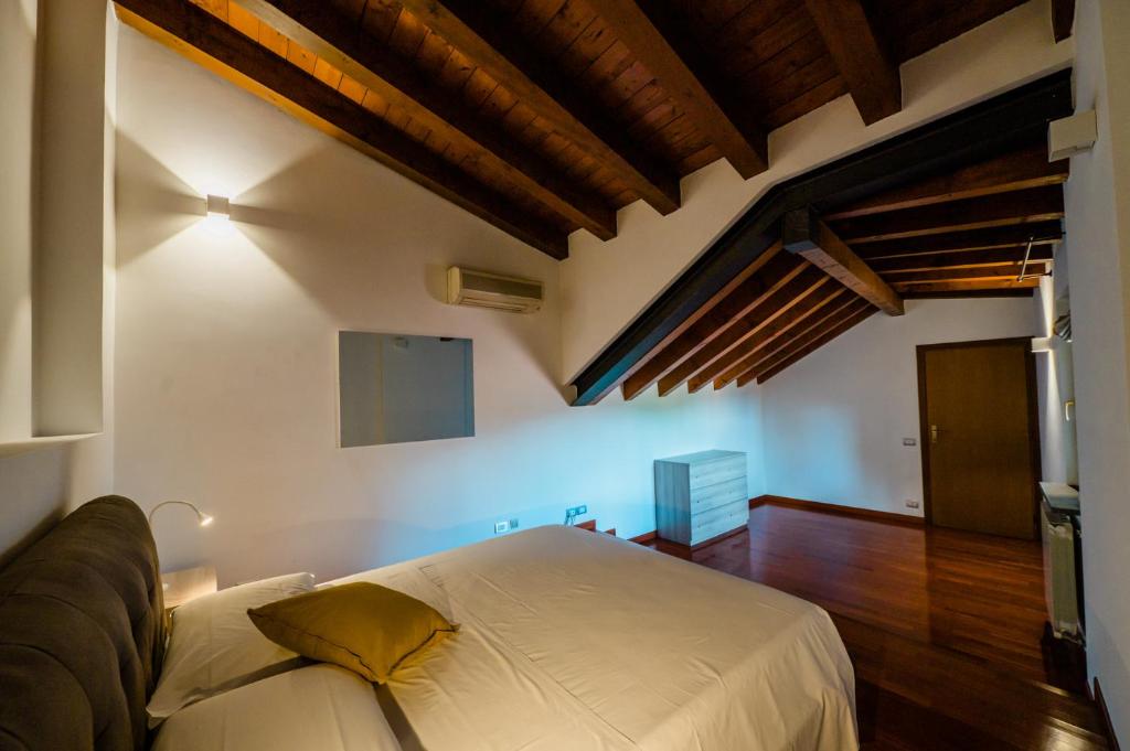 Posteľ alebo postele v izbe v ubytovaní Santa Caterina Roof
