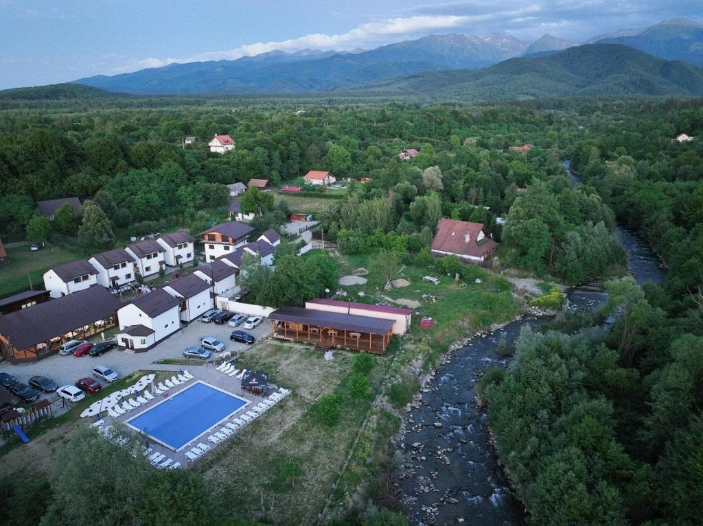 an aerial view of a resort with a swimming pool at Domeniul Roa in Avrig