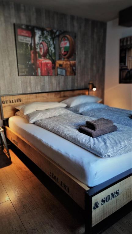 Postel nebo postele na pokoji v ubytování Roastineer Hotel