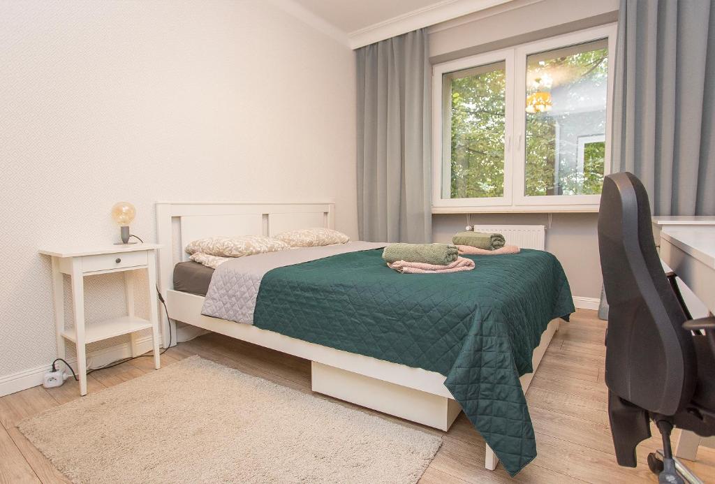 Posteľ alebo postele v izbe v ubytovaní Duży apartament w centrum przy rynku