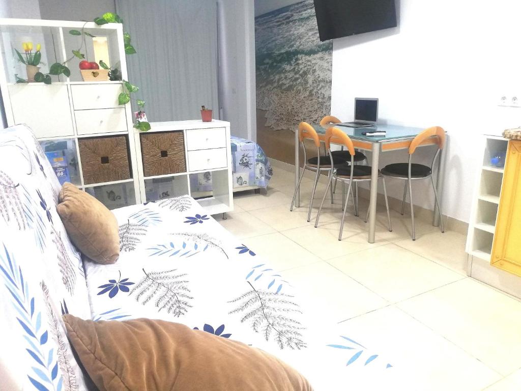 TV a/nebo společenská místnost v ubytování Poema del Mar