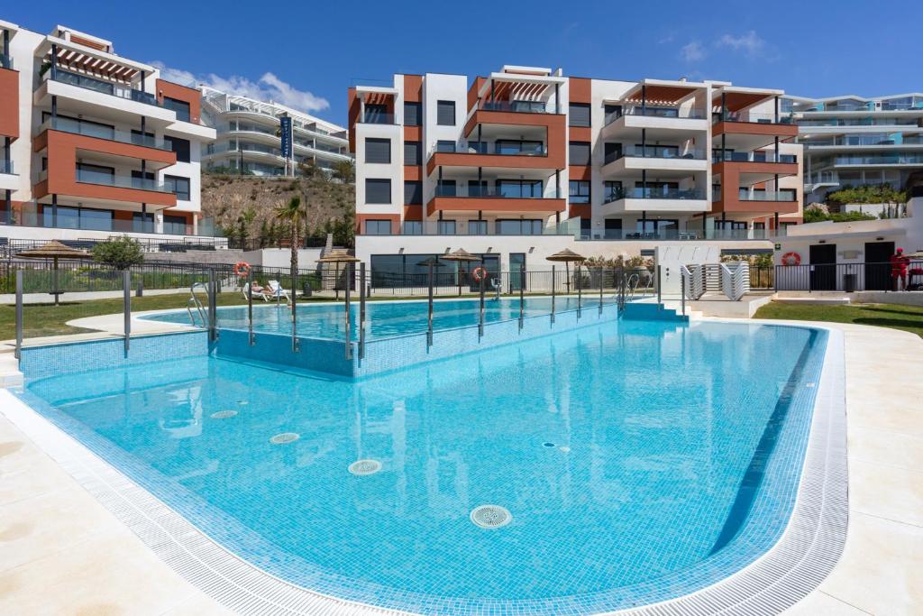 Bazén v ubytování Luxurious apartment with Pool and Gym El Higueron by Costarentals - Ref 149 nebo v jeho okolí