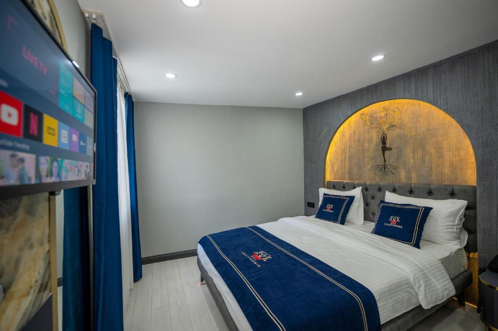 Postel nebo postele na pokoji v ubytování Hotel California