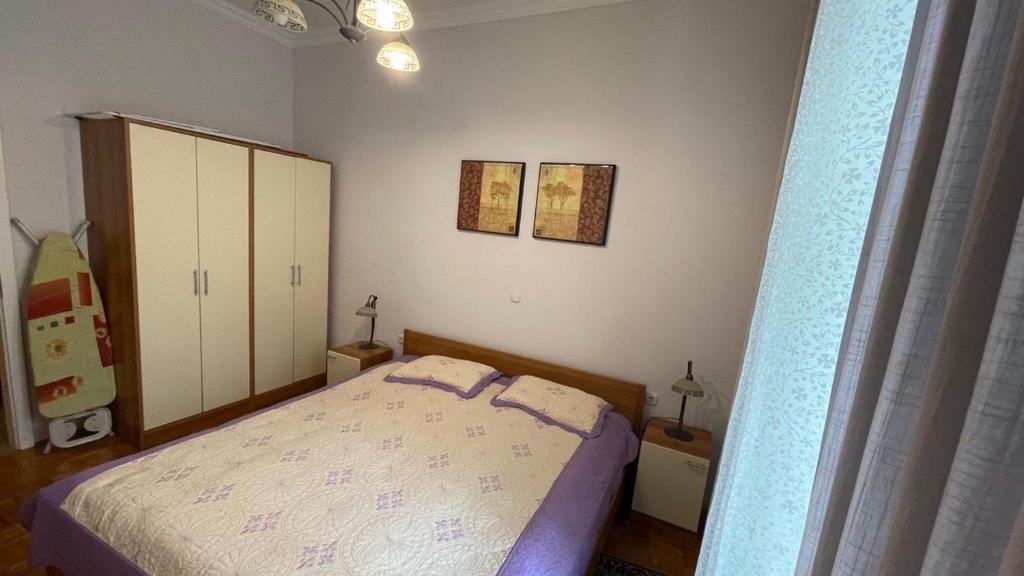 Postel nebo postele na pokoji v ubytování Apartment Juliana