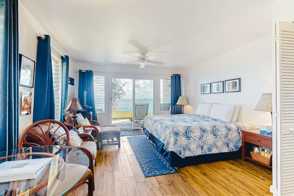 a hotel room with a bed and a window at Kapa'a Sands 14 in Kapaa