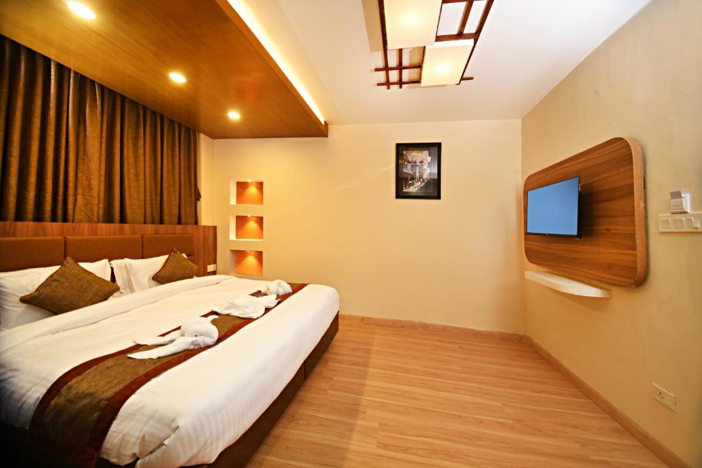 Postel nebo postele na pokoji v ubytování Capital Boutique Hotel