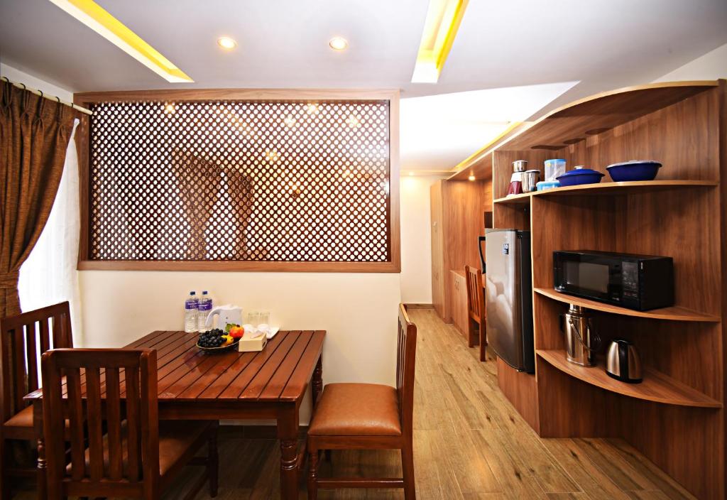 Kuchyň nebo kuchyňský kout v ubytování Capital Boutique Hotel