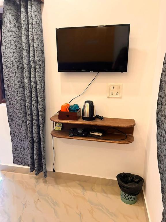 TV a/nebo společenská místnost v ubytování TGI Guest Houses