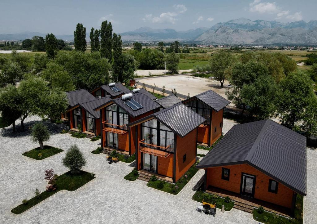 an overhead view of a house with solar panels on it at Hysaj Agroturizëm in Shkodër