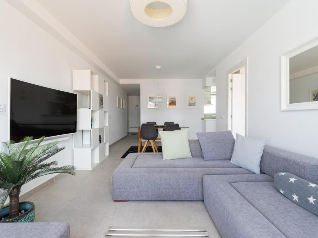 A television and/or entertainment centre at Leyre Mar Canteras by Canariasgetaway