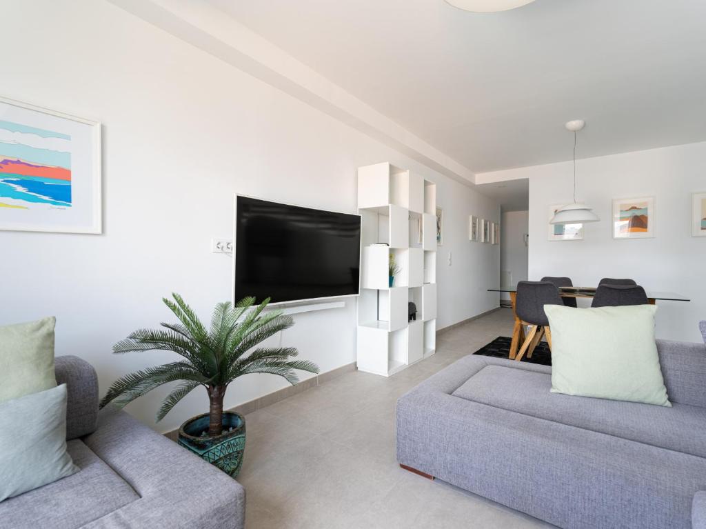 A television and/or entertainment centre at Leyre Mar Canteras by Canariasgetaway