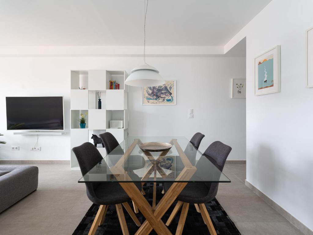 A television and/or entertainment centre at Leyre Mar Canteras by Canariasgetaway