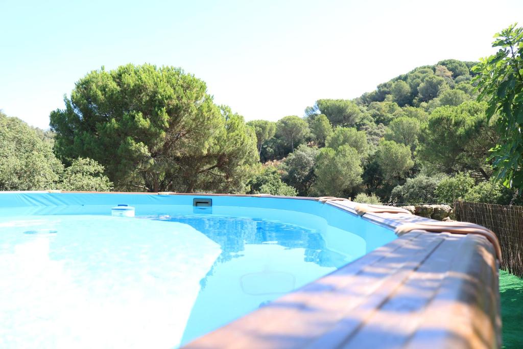 The swimming pool at or close to EL RINCON DE ANGELA