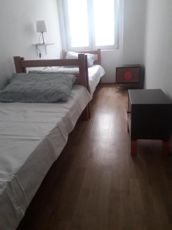 Postel nebo postele na pokoji v ubytování Jasmin