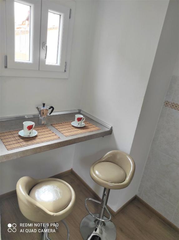 Zdjęcie z galerii obiektu ATTICO RUCELLAI CON TERRAZZA SUPER VISTA we Florencji