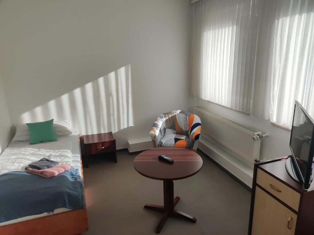 Postel nebo postele na pokoji v ubytování Zimmer am Jüdenhof