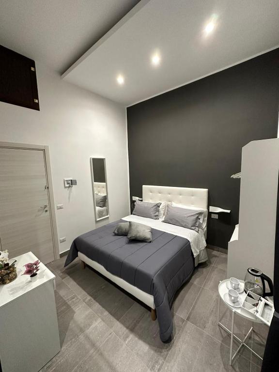 Posteľ alebo postele v izbe v ubytovaní B&B Carme